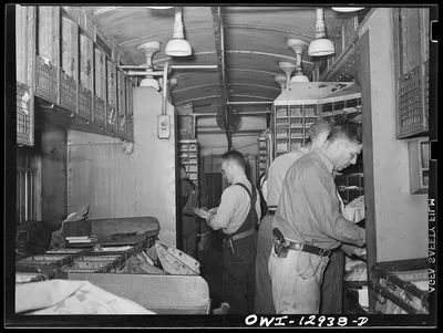 Sorting mail on board a mail car, 1938