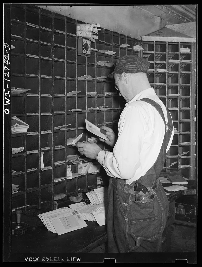 Sorting mail on board a mail car, 1938
