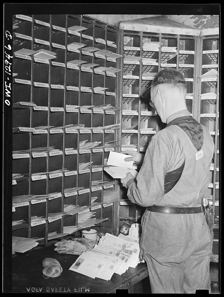 Sorting mail on board a mail car, 1938