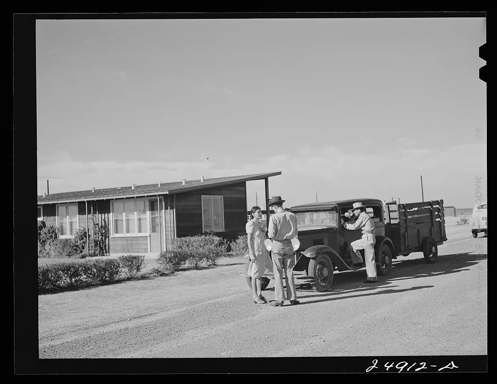 Camp manager says good-bye to family leaving camp. Robstown FSA (Farm…, Texas, 1942