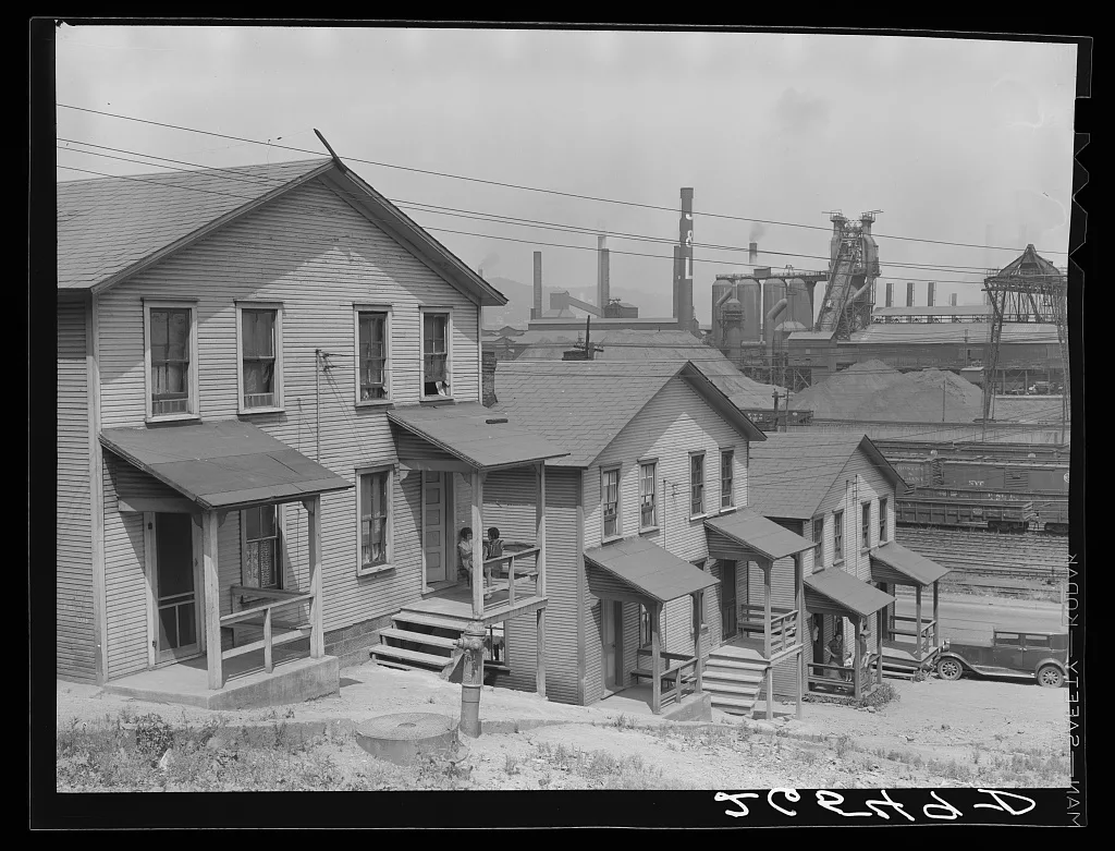 Workers' homes with steel plant in background. Aliquippa, Pennsylvania, 1938