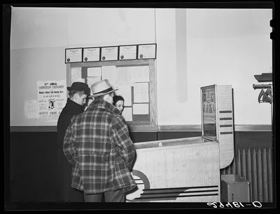 Group at pinball machine. Clinton, Indiana, 1940
