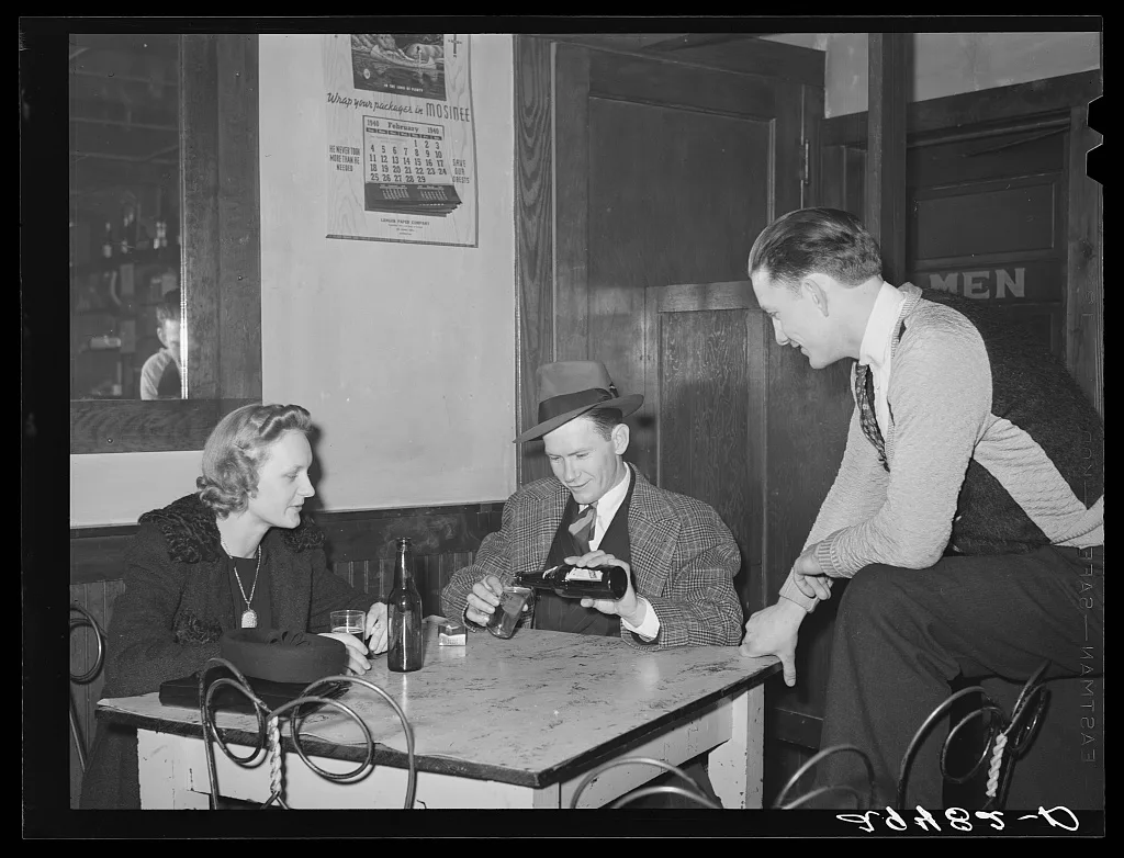 Between dances, couples relax in adjoining beer parlor. Marshalltown,…, Iowa, 1940
