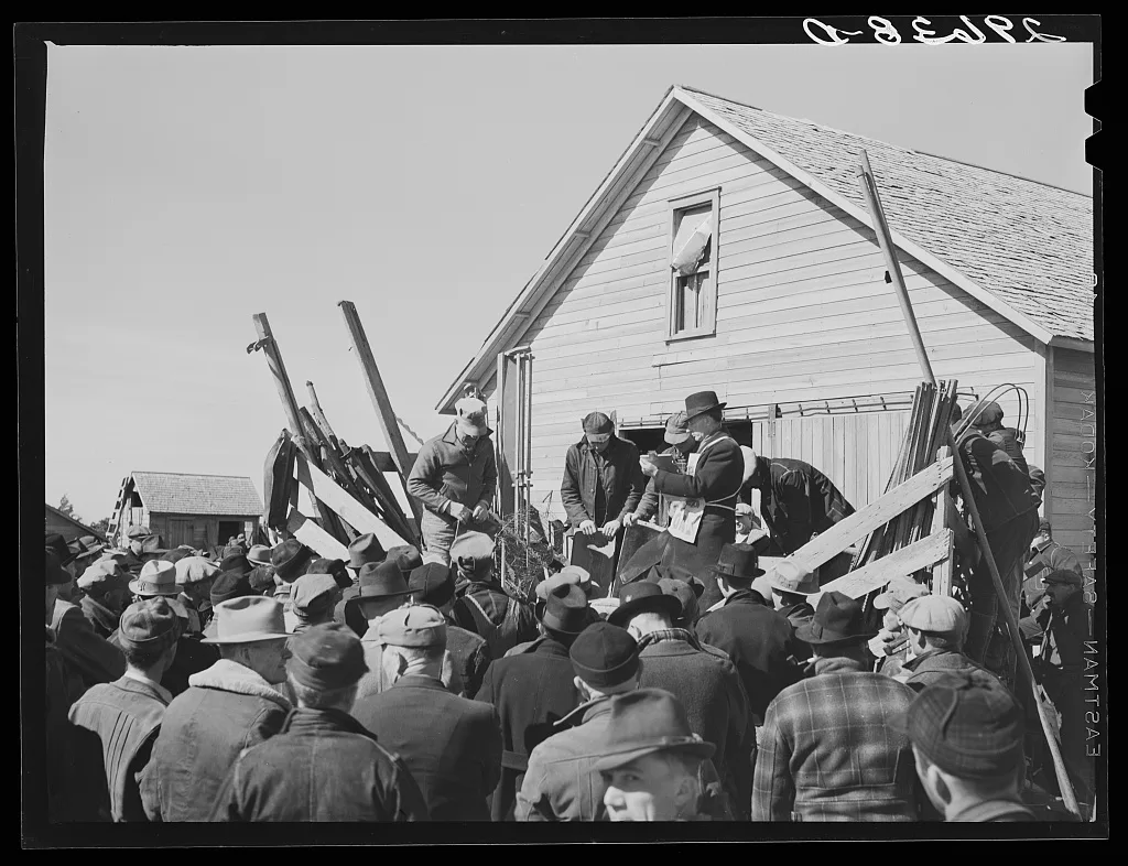 Auctioning farm equipment at Zimmerman farm near Hastings, Nebraska, 1940