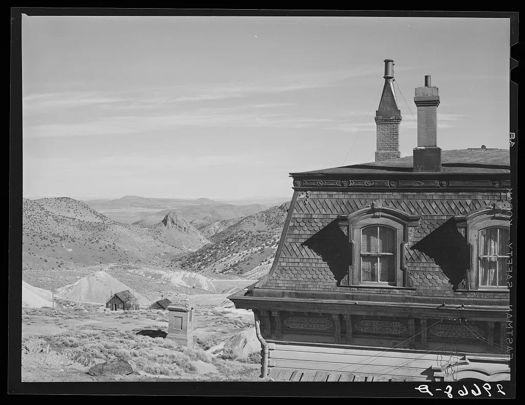 Corner of old mine office, abandoned mines in distance. Virginia…, Nevada, 1940