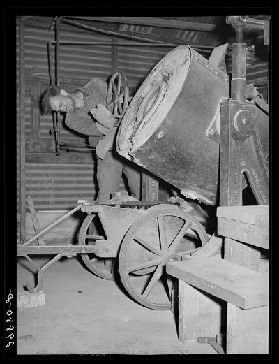[Untitled photo, possibly related to: Pouring molten gold into brick.…, Nevada, 1940