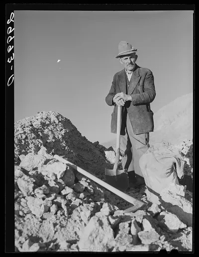 Rocky Mountain George, old prospector, at his diggings. Esmeralda…, Nevada, 1940