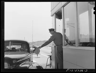 Pennsylvania Turnpike, Pennsylvania. Paying toll, 1942